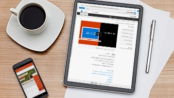 صورة لجهاز كمبيوتر لوحي تظهر المعلومات الأساسية على شاشته وبجواره كوب قهوة وتجهيزات مكتبية