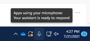 Екранна снимка на иконата на микрофона в лентата на задачите.