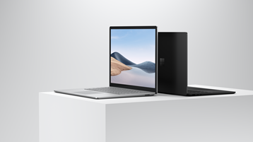 Dva přenosné počítače Surface se zpětným pohledem
