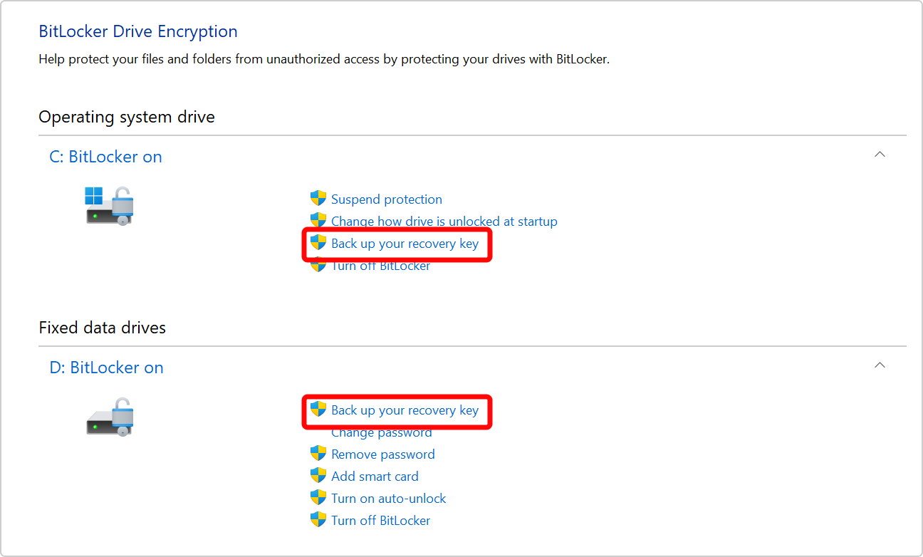 Skærmbillede af Kontrolpanel, der viser muligheden for at sikkerhedskopiere BitLocker-genoprettelsesnøglen til både OS-drevet og et datadrev.