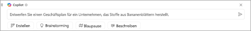 Screenshot des Copilot-Textfelds im Zeichenbereich. In das Textfeld eingegebener Prompt „Entwerfen eines Geschäftsplans für ein Unternehmen, das Stoff aus Bananenblättern herstellt“.