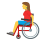 Woman in manual wheelchair emoticon