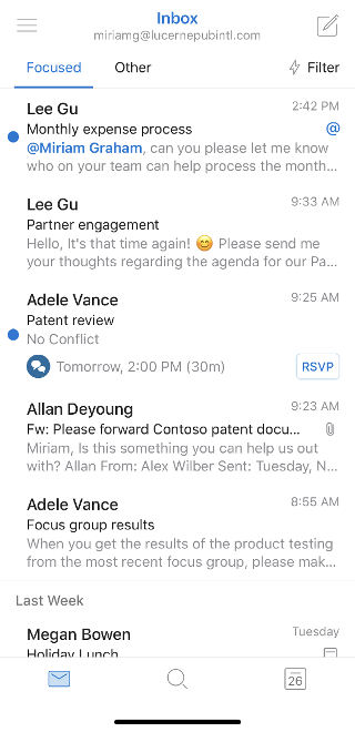 Shows emails in an inbox. At the top, the email begins with an at mention.