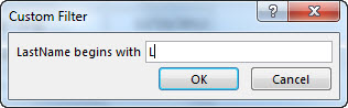 The Custom Filter dialog box with the letter "L" entered.