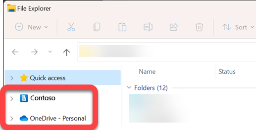 In the navigation pane on the left side of File Explorer, there are top-level folders for a synced SharePoint library and a synced OneDrive.