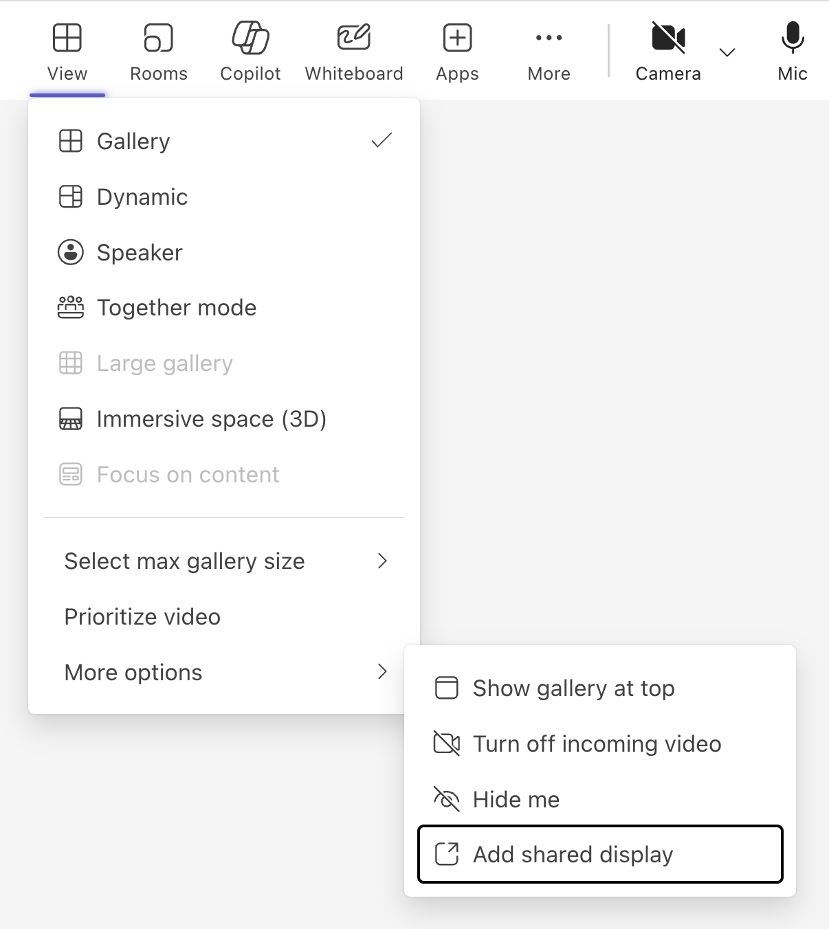 The view switcher, denoted by the "View" button in the Teams meeting menu bar, contains an option to add a shared display mode under the "More Options" sub menu.
