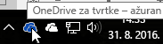 Snimka zaslona koja pokazuje pokazivač iznad plave ikone aplikacije OneDrive na programskoj traci s tekstom „OneDrive za tvrtke”.