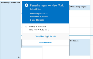 Memperlihatkan kartu perjalanan di Kalender Outlook