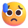Emoji wajah tim sedih tapi lega