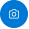 "Android" nuskaitymo mygtukas yra baltas fotoaparatas, apibrėžtas mėlyname fone.