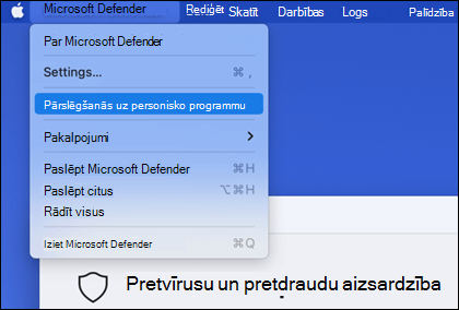 The Microsoft Defender menu opened to show "Switch to personal app" selected.