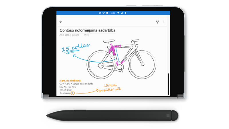 Surface Duo ar zīmēšanas programmā OneNote un Surface slim pildspalvu blakus tai