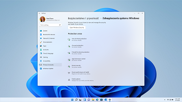 Ekran systemu Windows 11 przedstawiający ustawienia prywatności i zabezpieczeń oraz ustawienia zabezpieczeń systemu Windows