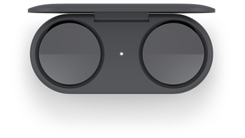 Słuchawki douszne Surface Earbuds umieszczone w etui ładowania