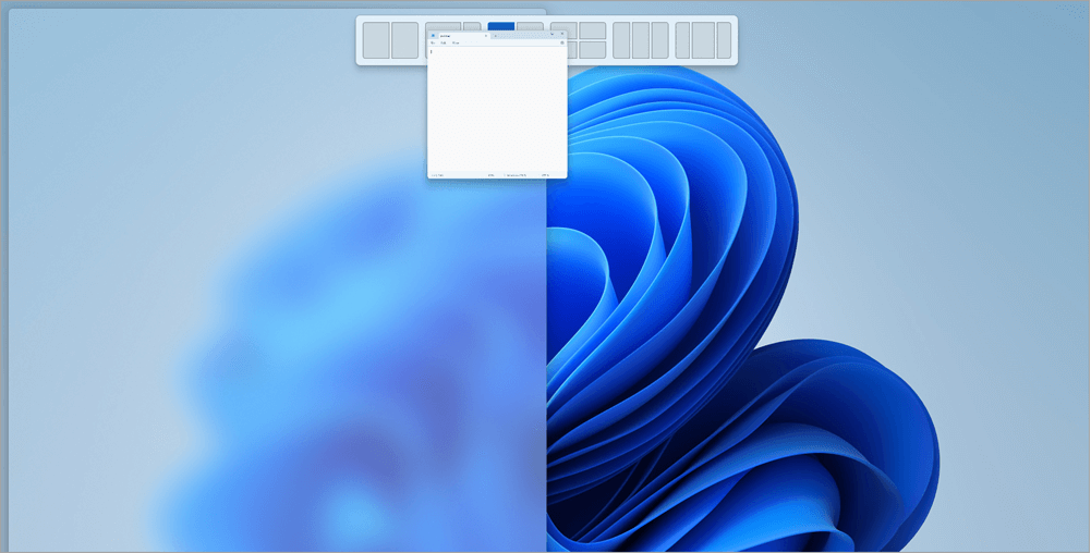 Abra layouts de snap usando o mouse para arrastar sua janela até a parte superior da tela.