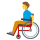 Homem em ícone de cadeira de rodas manual