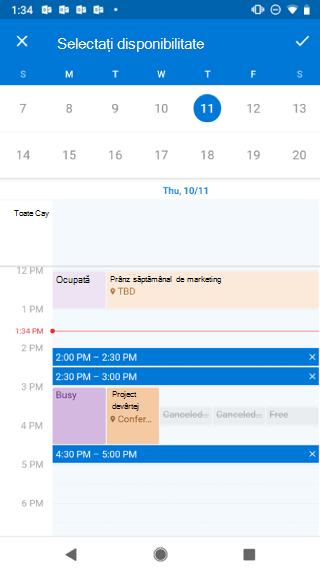 Afișează un calendar pe un ecran Android. Deasupra calendarului, scrie "Selectați disponibilitate" și există un buton de marcaj în partea dreaptă a acestuia.