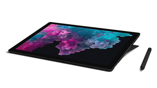 Slika naprave Surface Pro 6 v načinu studia s peresom za Surface ob njej