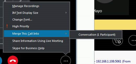 Selecting Merge this call into button in the Skype for Business call window