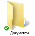 Додаткова зелена піктограма синхронізації у OneDrive